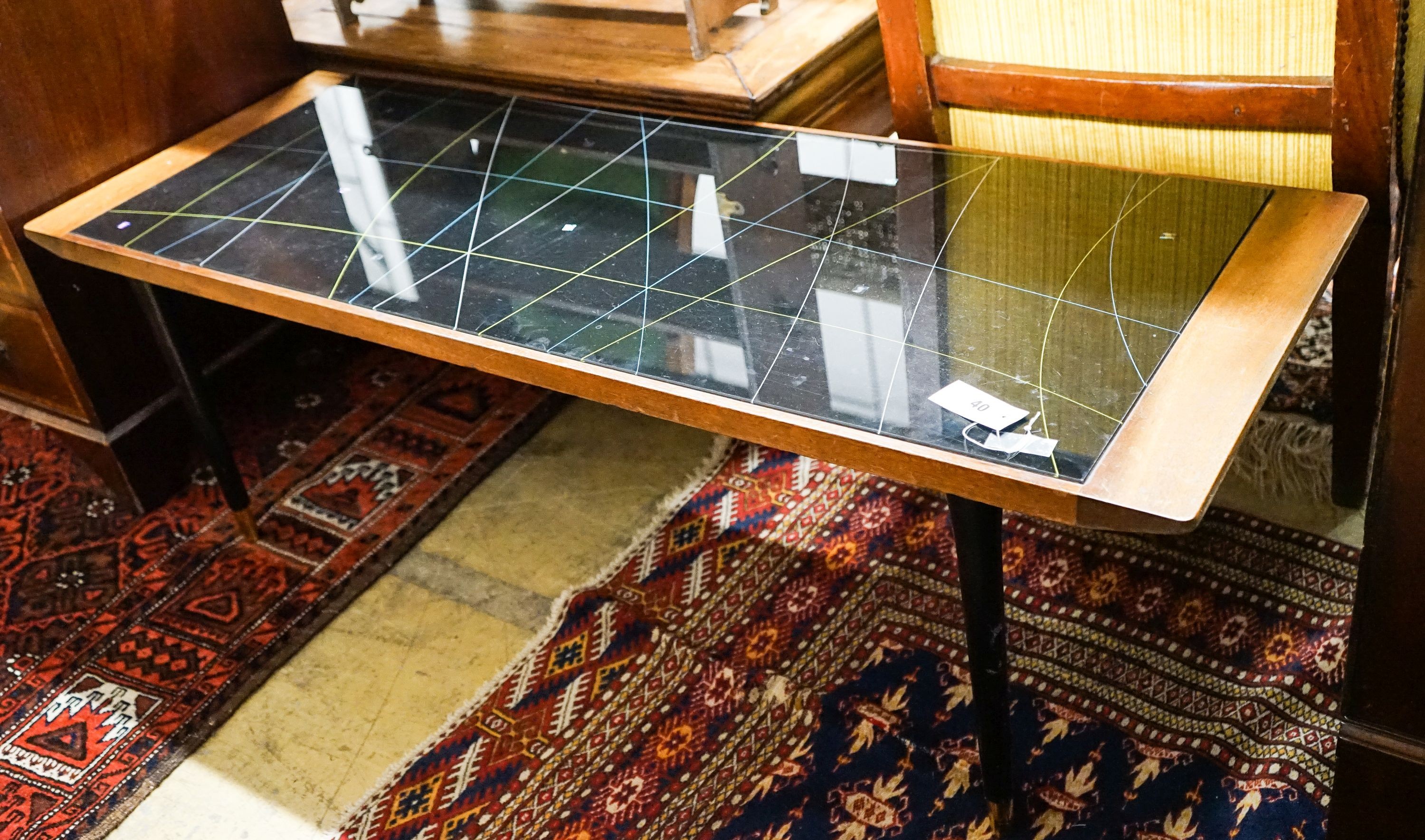 A mid century design teak and perspex 'Galaxy' rectangular coffee table, width 129cm, depth 46cm, height 42cm